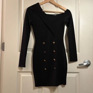 Asymmetrical long sleeved little black dress